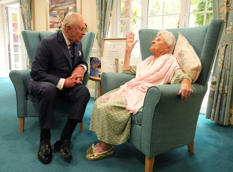 King Charles III meets world's oldest person