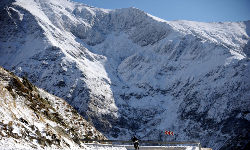 Motorcyclist riding high up on Transfagarasan road