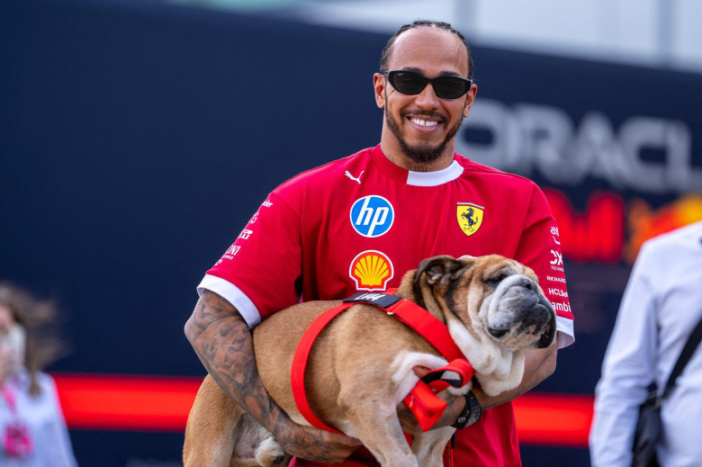 Silverstone, UK. 04th July, 2025. Lewis Hamilton (Gbr) of Scuderia Ferrari #44 and Roscoe Hamilton (dog) during the Formula 1 Qatar Airways British Grand Prix 2025 on Friday at the Silverstone International Circuit, Silverstone, Great Britain on July 4, 2