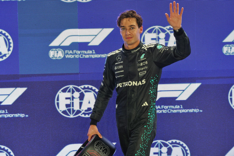 George Russell (GBR) Mercedes AMG F1 celebrates his pole position in qualifying parc ferme. 04.10.2025. Formula 1 World Championship, Rd 18, Singapore Grand Prix, Marina Bay Street Circuit, Singapore, Qualifying Day. Photo credit should read: XPB/Alamy L