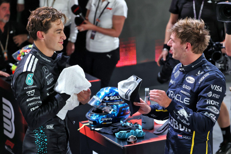 (L to R): Pole sitter George Russell (GBR) Mercedes AMG F1 in qualifying parc ferme with second placed Max Verstappen (NLD) Red Bull Racing. 04.10.2025. Formula 1 World Championship, Rd 18, Singapore Grand Prix, Marina Bay Street Circuit, Singapore, Quali