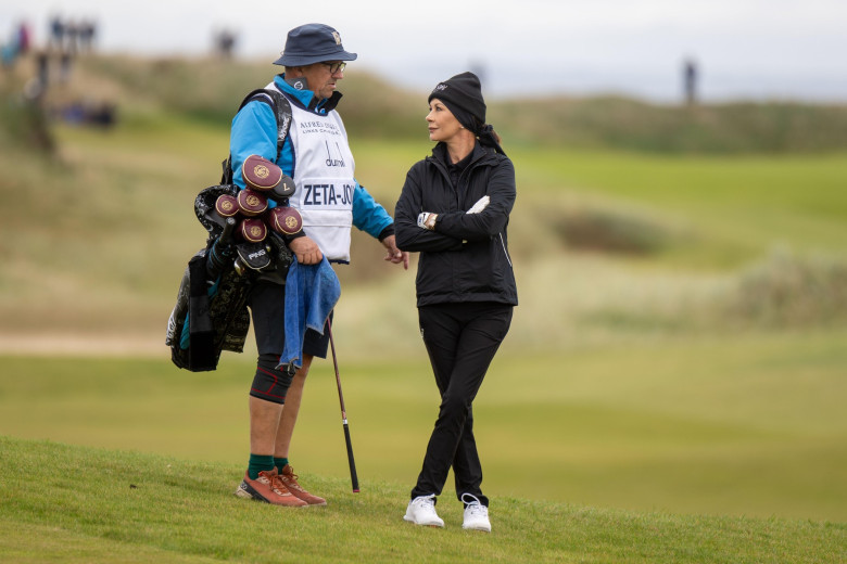 Kingsbarns, Scotland. 3rd October 2025. Hollywood actress Catherine Zeta-Jones and her caddie during the second round of the Alfred Dunhill Links Championship. Credit:Tim Gray/Alamy Live News