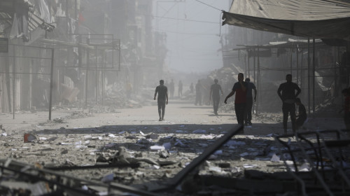 Palestinians inspect the destruction after Israeli airstrike hit Bank of Palestine in Gaza Strip, Gaza city, Gaza Strip, Palestinian Territory - 24 Sep 2025