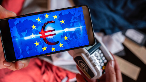 Bavaria, Germany - August 27, 2025: Symbolic introduction of the DIGITAL EURO - Clothing is paid for with digital euros