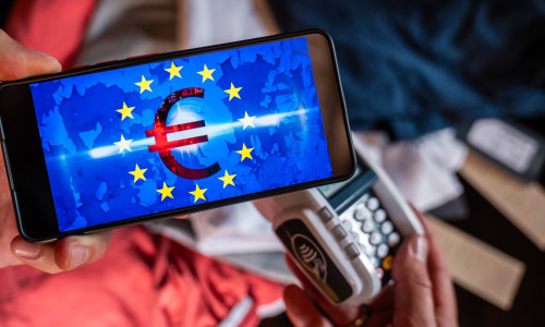 Bavaria, Germany - August 27, 2025: Symbolic introduction of the DIGITAL EURO - Clothing is paid for with digital euros