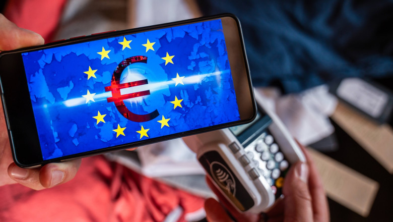 Bavaria, Germany - August 27, 2025: Symbolic introduction of the DIGITAL EURO - Clothing is paid for with digital euros