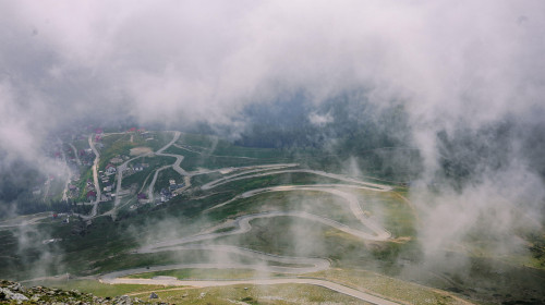 The Transalpina is the highest road in Romania, crossing the Carpathians with stunning mountain views, sharp turns, and breathtaking scenery.