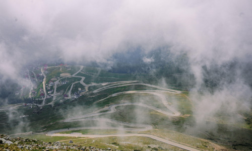 The Transalpina is the highest road in Romania, crossing the Carpathians with stunning mountain views, sharp turns, and breathtaking scenery.