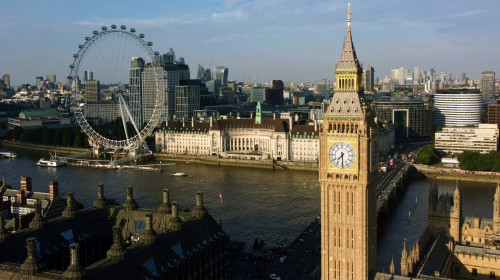 Big Ben and The London Eye are seen on a summer evening