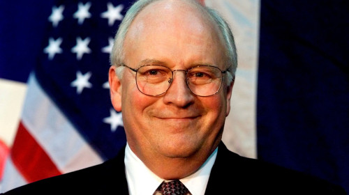 FILE PHOTO: Republican vice presidential candidate Dick Cheney listens [as his wife Lynne] introduces him during..