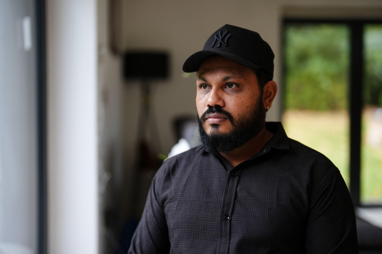 EMBARGOED TO 0600 GMT MONDAY NOVEMBER 3 The sole survivor of the Air India crash, Vishwash Kumar Ramesh, poses for a photo in Oadby, near Leicester, following an interview with the PA news agency. Briton Ramesh survived the disaster on June 12 that killed