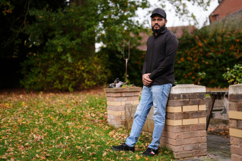 EMBARGOED TO 0600 GMT MONDAY NOVEMBER 3 The sole survivor of the Air India crash, Vishwash Kumar Ramesh, poses for a photo in Oadby, near Leicester, following an interview with the PA news agency. Briton Ramesh survived the disaster on June 12 that killed