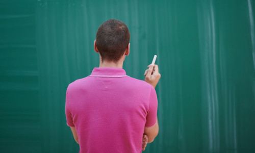 The student does the task on the board