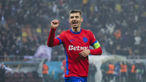 10 Florin Tanase celebrates scoring his first goal of the matchand winning the match