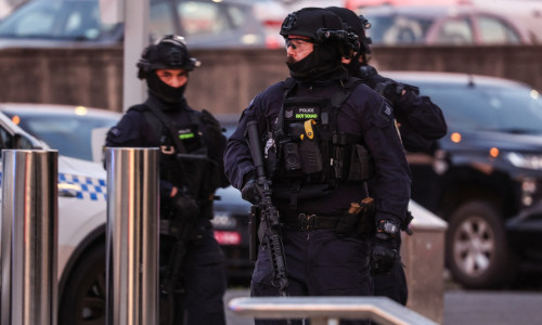 Polițiști surprinși în Australia, după atacul armat de pe plaja