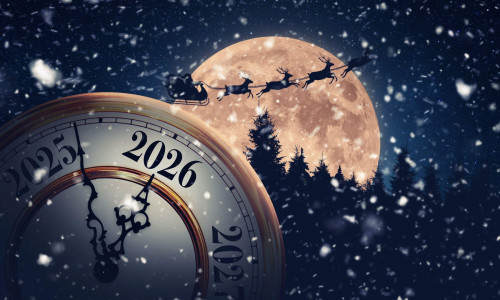 Magical holiday time transition to 2026. A snowy, New Year's Eve clock is set against a massive full moon with Santa Claus and his reindeer flying acr