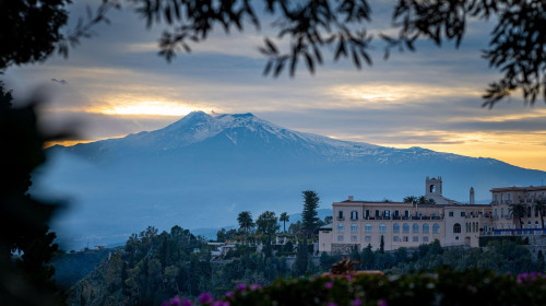 The Etna volcano seen from the old town of Taormina, Sicily, Italy. Taken in the evening with no people