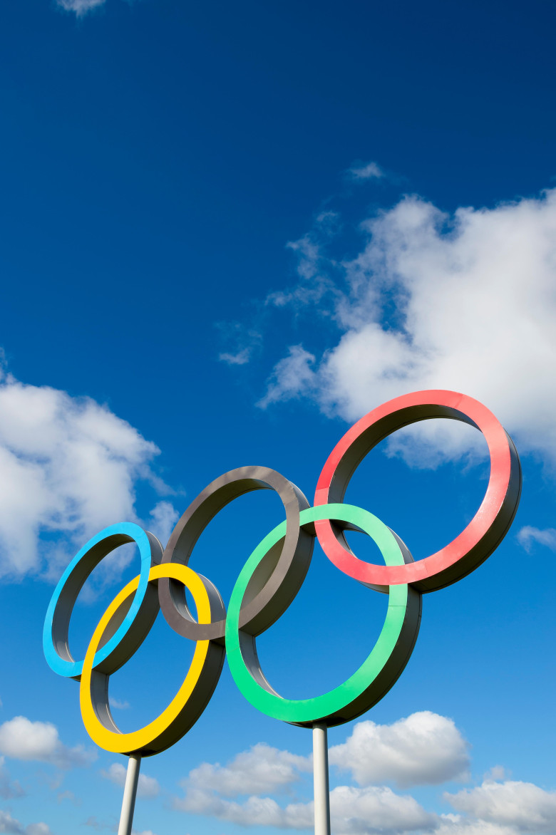 LONDON, UK - OCTOBER 14, 2015: A large display of the Olympic rings stands in bright blue sky in Queen Elizabeth Olympic Park.