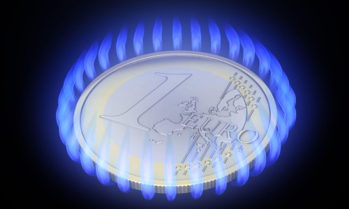 Euro coin surrounded by gas flames - gas prices are rising