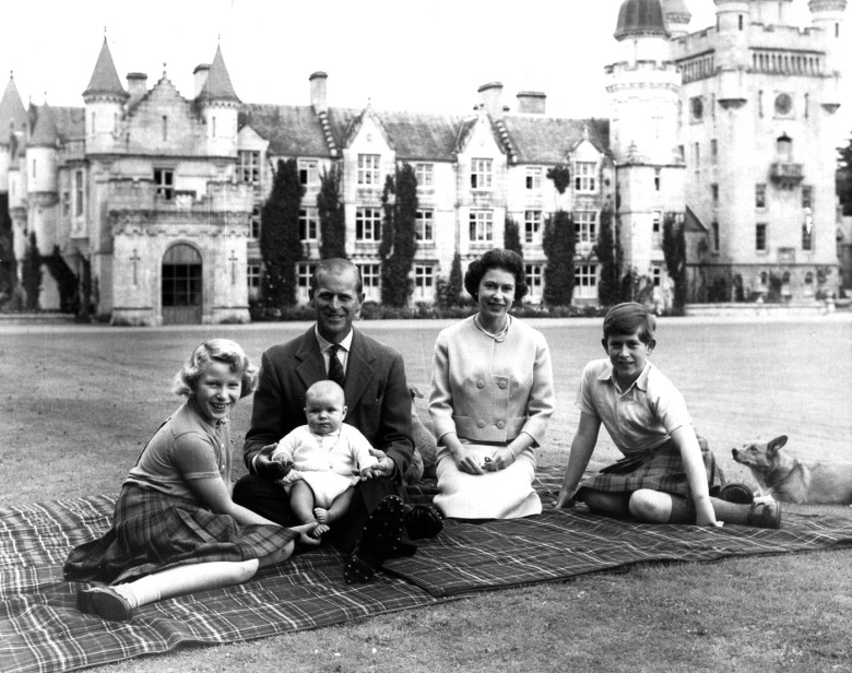 1960 Queen Elizabeth II English Misc,Sitting on a rug in the grounds of Balmoral Castle , Scotland , The Queen , Duke of Edinburgh , Prince Charles , Princess Anne and Prince Andrew , pose for a photograph . The Royal family is at present on holiday at B