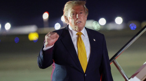 President Trump Aboard Air Force One Stops At Royal Air Force Mildenhall En Route Back From NATO Summit In Turkey