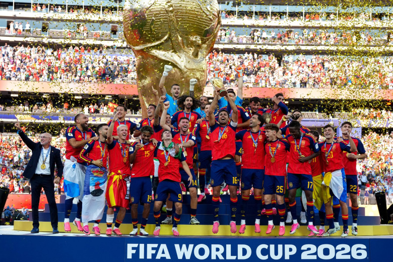 Spain’s Rodri lifts the world cup trophy as his team celebrate winning the FIFA World Cup 2026 final at the New York-New Jersey Stadium. Picture date: Sunday July 19, 2026.