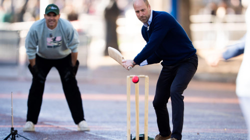The Prince of Wales batting as he joins cricketing stars from the UK and India, the team from Tailenders and Backyard Cricket, at a special Earthshot Prize event on The Mall, in London, organised by the team at Backyard Cricket to celebrate ties between t