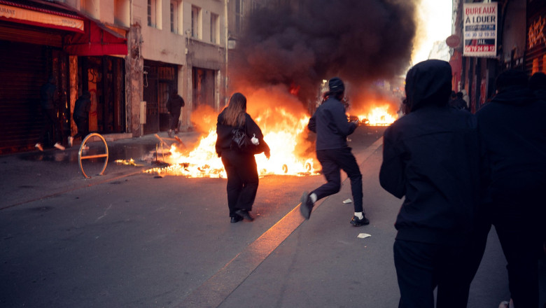 Paris, France. 18th Oct, 2026. Protesters clash with police at Place de la Republique in Paris, France, October 18, 2026, the day after a nationwide mobilization against the high cost of living drew 110,000 demonstrators in the capital. The unsanctioned g