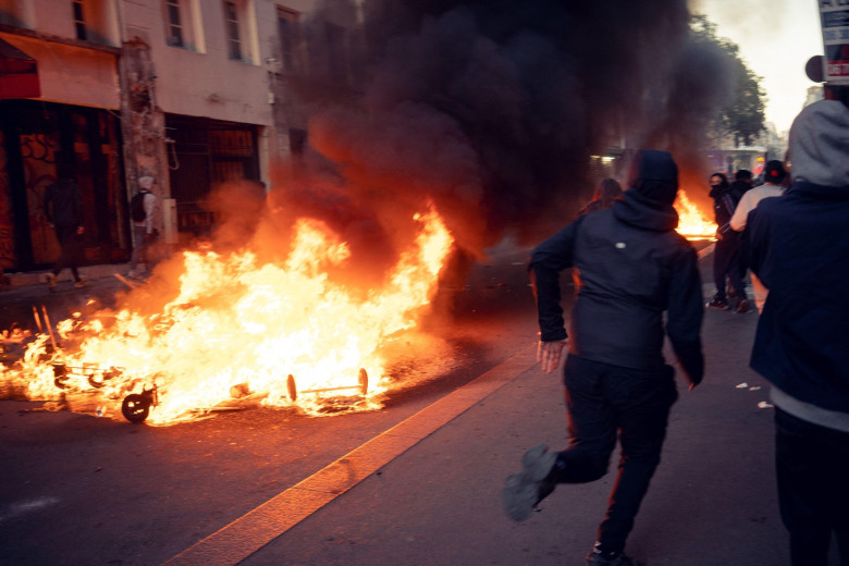 Paris, France. 18th Oct, 2026. Protesters clash with police at Place de la Republique in Paris, France, October 18, 2026, the day after a nationwide mobilization against the high cost of living drew 110,000 demonstrators in the capital. The unsanctioned g