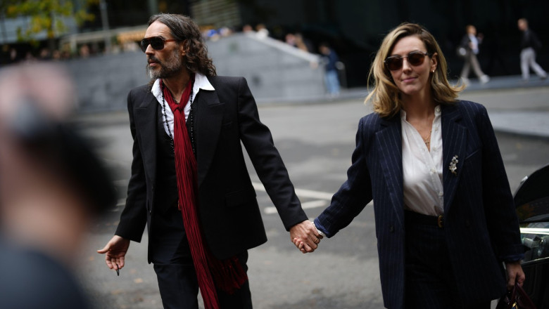 Russell Brand and his wife Laura Gallacher arriving at Southwark Crown Court, London, where he faces three charges of rape, indecent assault, and three counts of sexual assault, relating to six women. Picture date: Thursday October 29, 2026.