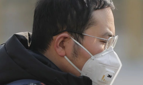 Coronavirus, chinez cu mască