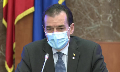 Ludovic Orban cu mască de protecție pe față