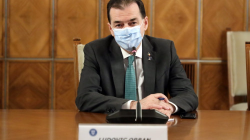 Ludovic Orban, la Guvern, cu mască de protecție
