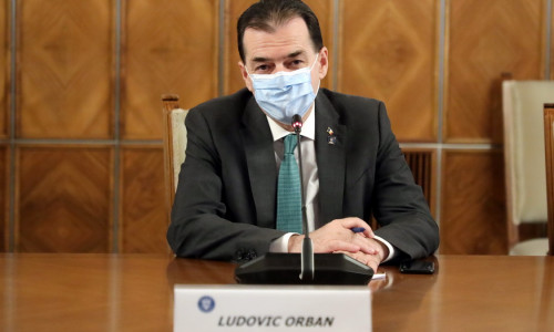 Ludovic Orban, la Guvern, cu mască de protecție