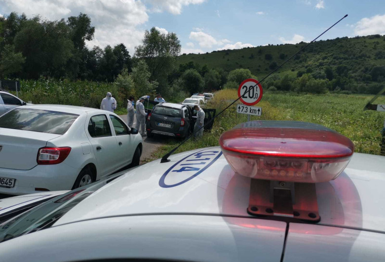 Mașini de Poliție la locul unei crime
