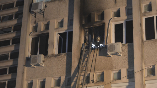 A firefighter inside the intensive care unit where a fire killed 10