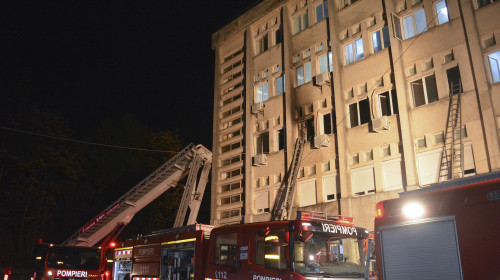 Firefighter ladders on the walls of the hospital in Piatra Neamt, where a fire killed 10 at COVID-19 intensive care unit