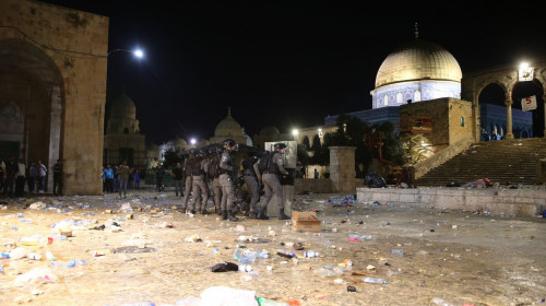 Israeli policemen gather during clashes with Palestinians at the compound that houses Al-Aqsa Mosque, Jerusalem, Palestinian Territory - 07 May 2021