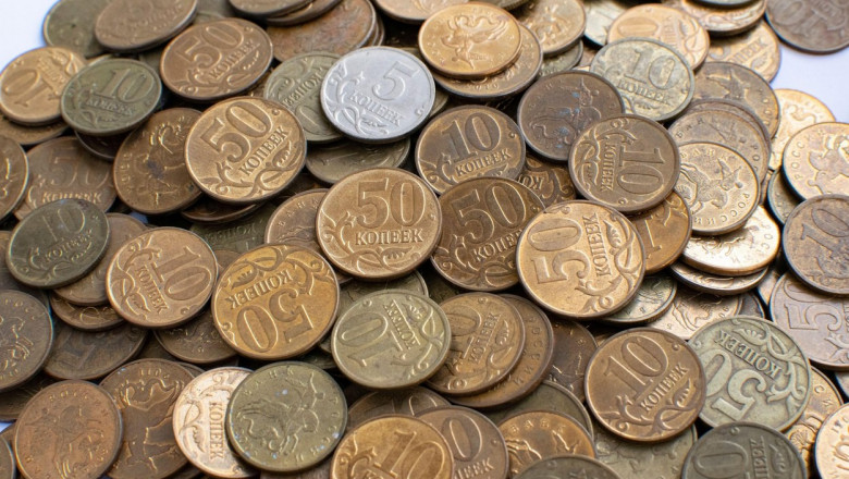 Small Russian coins close-up. Used coins. View from above. Coins in denominations of five, ten, fifty kopecks.