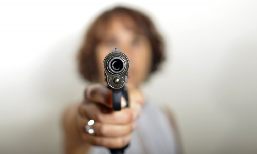 woman with gun