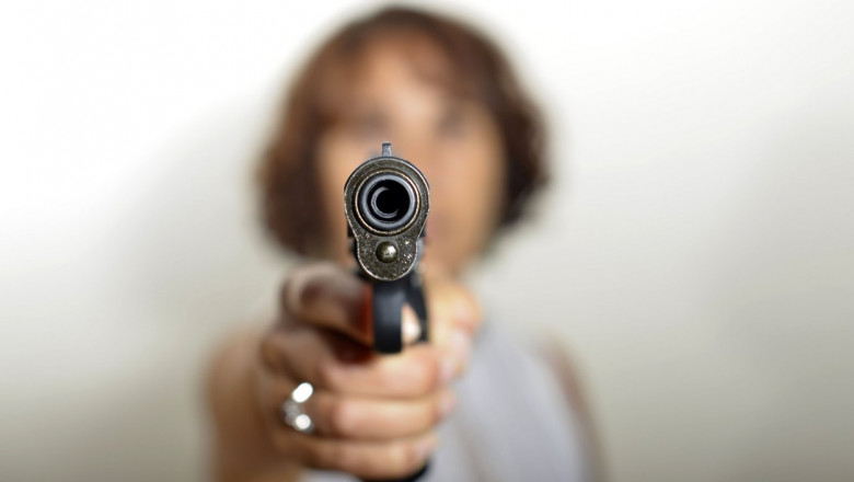 woman with gun