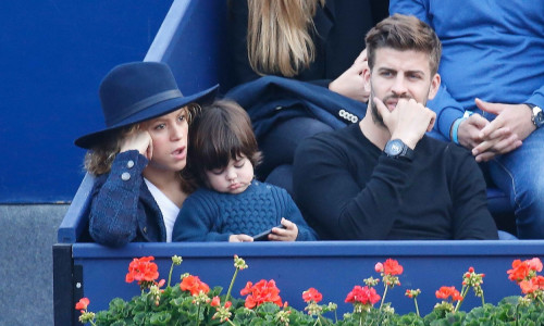 Pop singer Shakira & her family Gerard Piquet and son Milan seen watching the Tennis match in Barcelona