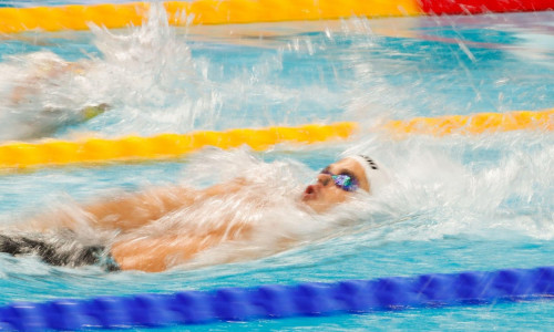 BUDAPEST, HUNGARY - JUNE 19: Robert Glinta of Romania competing at the Men's 100m Backstroke during the FINA World Aquatics Championships at the Duna Arena on June 19, 2022 in Budapest, Hungary (Photo by Nikola Krstic/Orange Pictures)