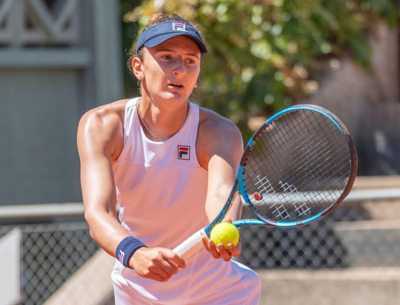 Lausanne Switzerland, 07/13/2022: Irina-Camelia Begu of Romania serve during Lausanne 2022 tennis tournament WTA 250. 16th final of the Lausanne 2022 tennis tournament WTA 250. Credit: Eric Dubost/Alamy Live News