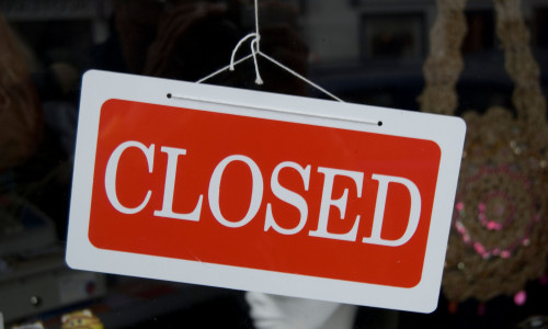 Closed sign in a store.