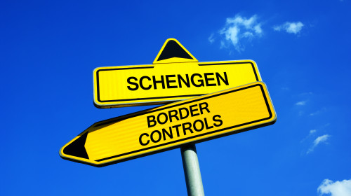 Schengen,Or,Border,Controls,-,Traffic,Sign,With,Two,Options