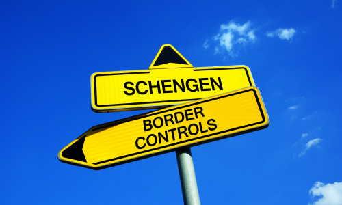 Schengen,Or,Border,Controls,-,Traffic,Sign,With,Two,Options