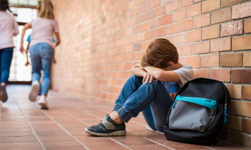 Little,Boy,Sitting,Alone,On,Floor,After,Suffering,An,Act