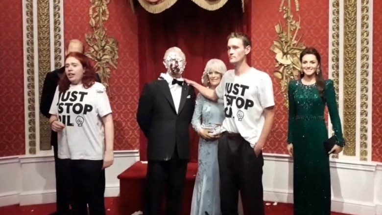 Eco protesters throw cake at King Charles waxwork