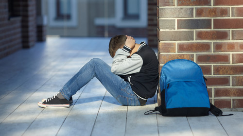 Schoolboy,Crying,In,The,Hallway,Of,The,School,,Negative,Emotion